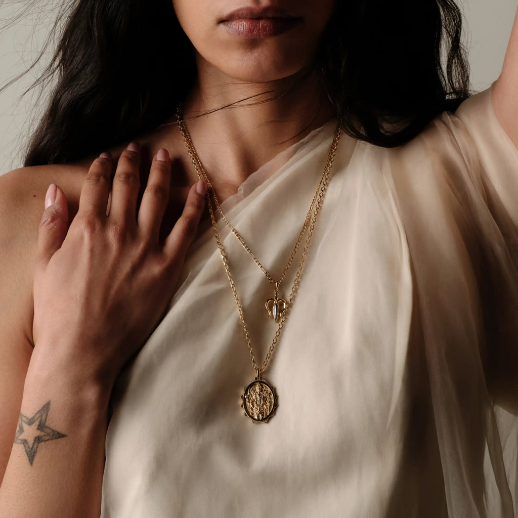 Mother of Pearl Trident Amulet