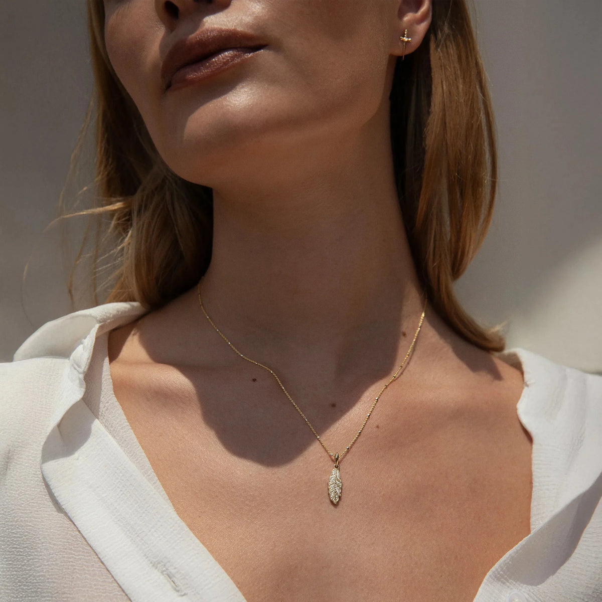 Diamond Feather Amulet