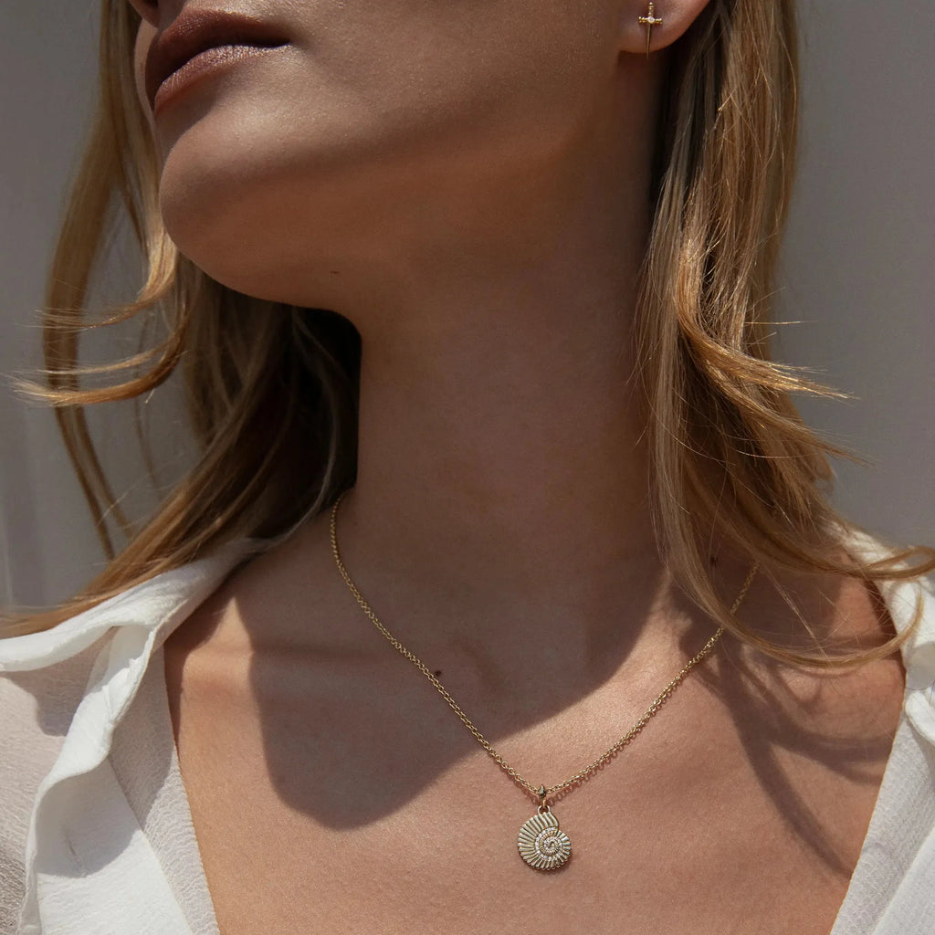 Diamond Spiral Shell Amulet