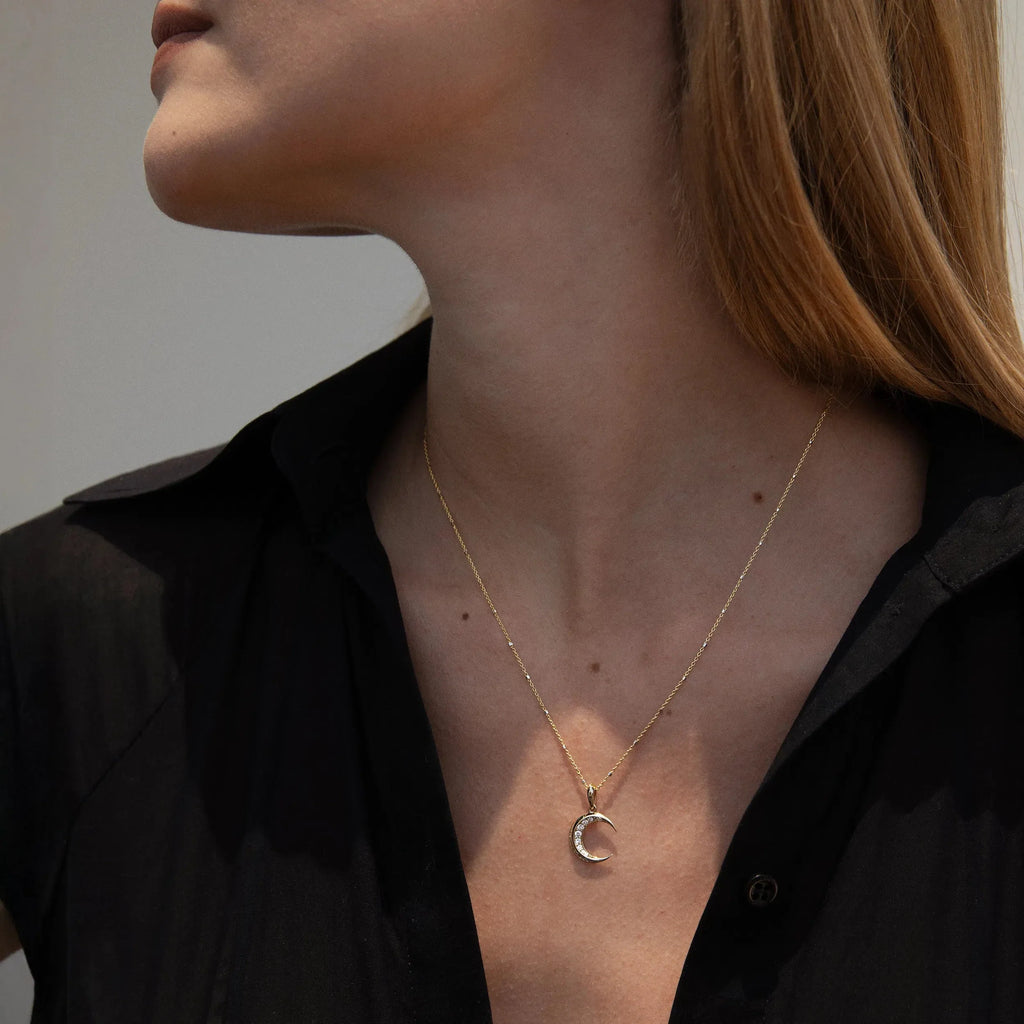 Diamond Twisted Moon Amulet